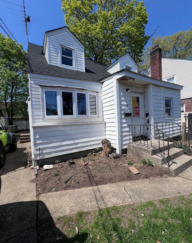 119 Broadfield Rd, Hempstead, NY 11550 - bungalow featuring fence and roof with shingles