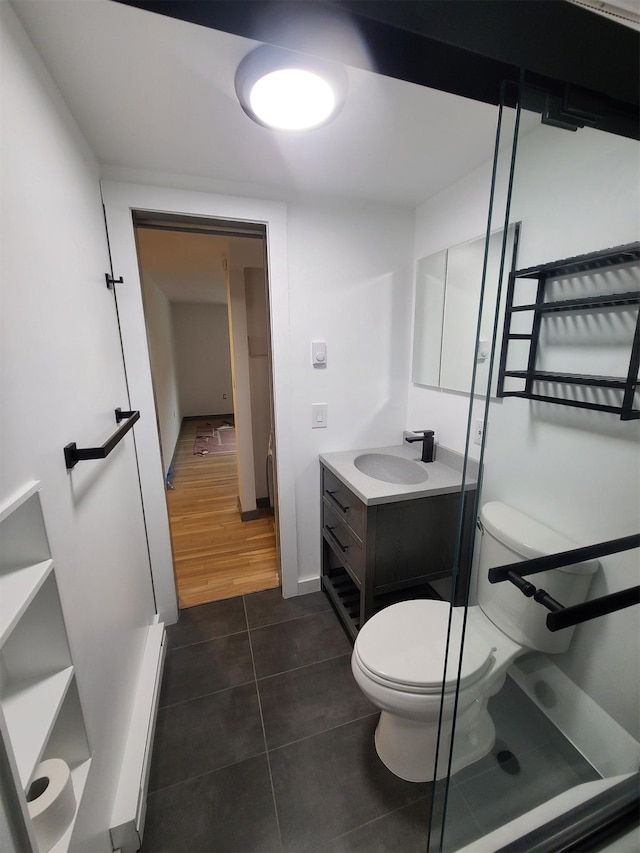 1404 Parr Lake Dr Unit 14D, Newburgh, NY 12550 - bathroom with toilet, vanity, tile patterned floors, and baseboards