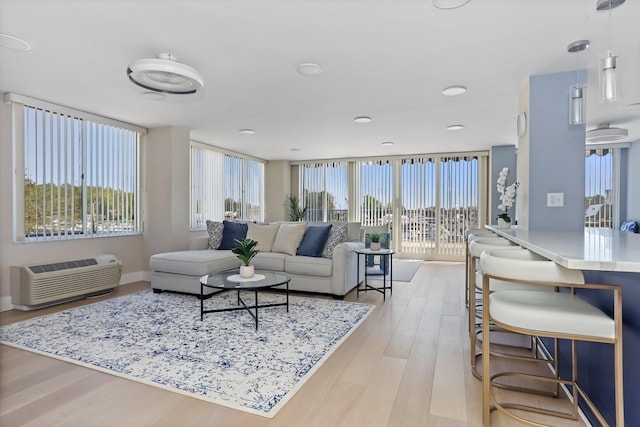 18 Shady Glen Ct Unit 302, New Rochelle, NY 10805 - living area with light wood-style floors and baseboards