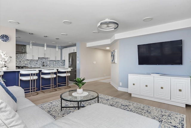 18 Shady Glen Ct Unit 302, New Rochelle, NY 10805 - living area featuring baseboards and light wood finished floors