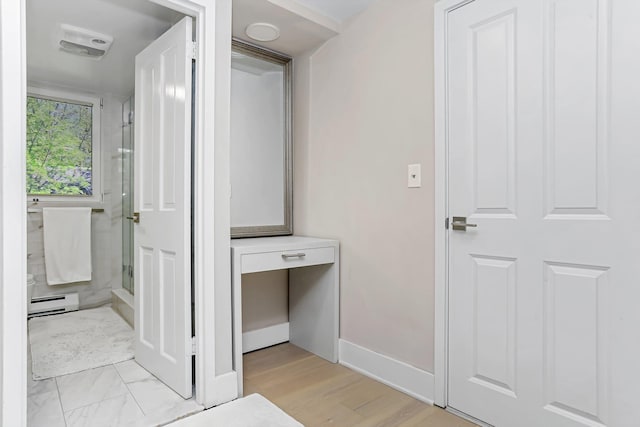18 Shady Glen Ct Unit 302, New Rochelle, NY 10805 - bathroom with baseboards, baseboard heating, and a shower stall