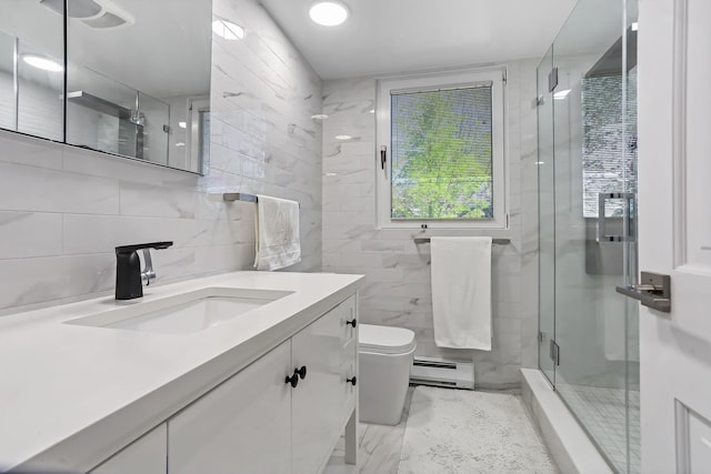 18 Shady Glen Ct Unit 302, New Rochelle, NY 10805 - full bathroom featuring vanity, toilet, tile walls, baseboard heating, and a stall shower