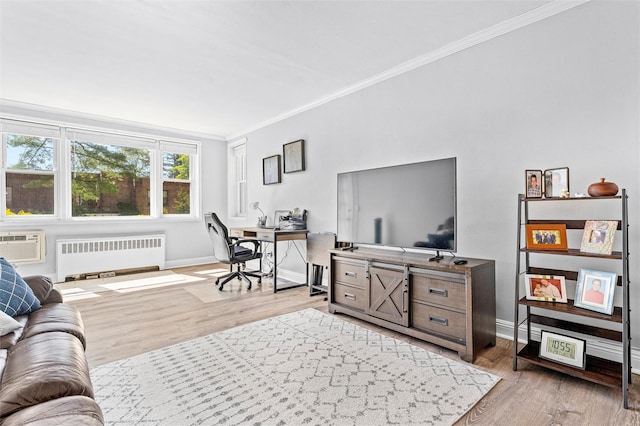 office area with light wood-style flooring, radiator, baseboards, a wall unit AC, and ornamental molding
