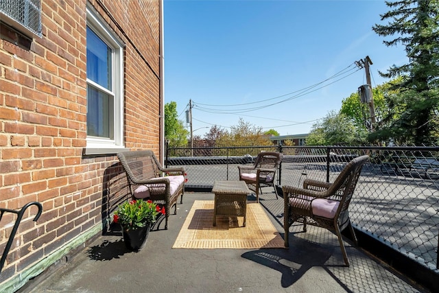 view of patio / terrace with a balcony