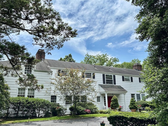 12 W Mall Dr, West Hills, NY 11743 - colonial-style house featuring a chimney