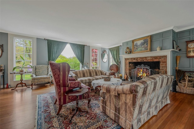12 W Mall Dr, West Hills, NY 11743 - living room with a fireplace, wood finished floors, and ornamental molding