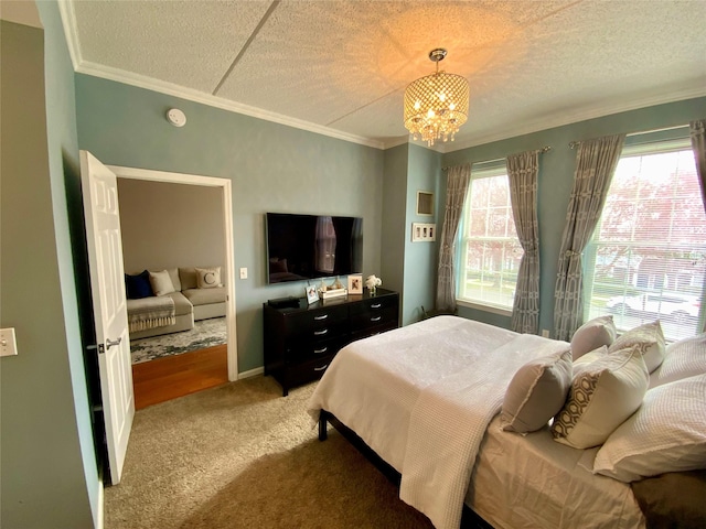 carpeted bedroom with ornamental molding and a notable chandelier