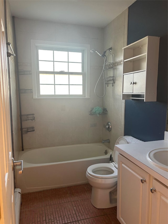 bathroom featuring tile patterned flooring, a baseboard heating unit, toilet, shower / tub combination, and vanity