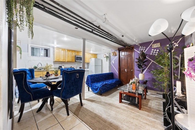 dining area with light tile patterned flooring