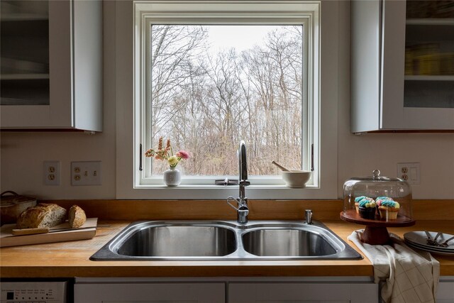 21 Private Way, Garrison, NY 10524 - kitchen with plenty of natural light, a sink, and white cabinetry