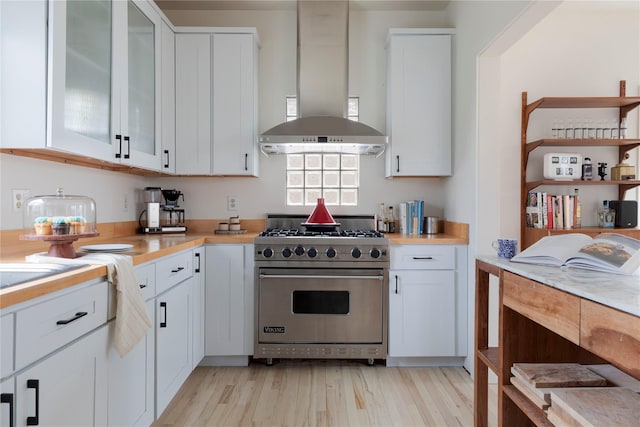 21 Private Way, Garrison, NY 10524 - kitchen featuring light countertops, light wood-type flooring, luxury range, and island range hood