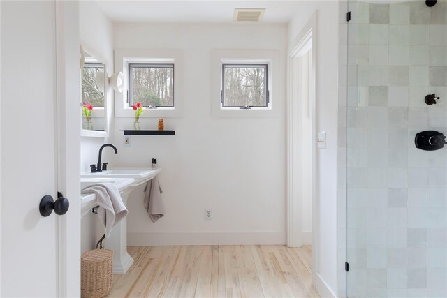 21 Private Way, Garrison, NY 10524 - full bath featuring baseboards, visible vents, wood finished floors, and a stall shower