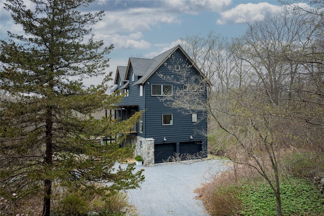 21 Private Way, Garrison, NY 10524 - view of side of home with a garage and gravel driveway