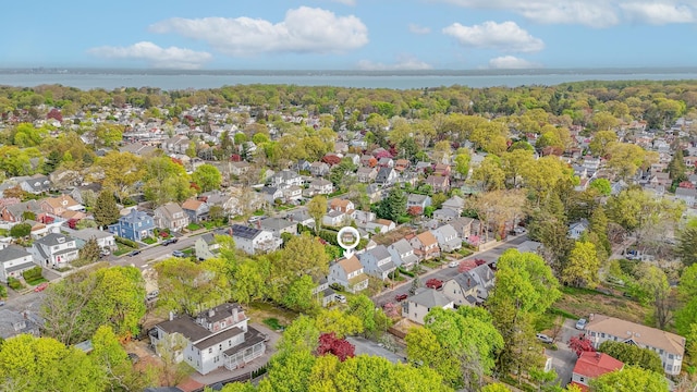 aerial view with a residential view and a water view