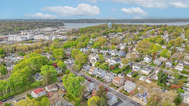 aerial view featuring a water view and a residential view