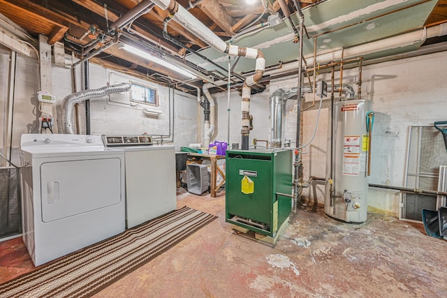unfinished below grade area featuring water heater, a heating unit, and washing machine and dryer
