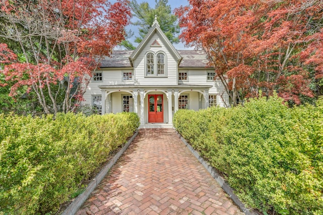 64 Paulding Ave, Cold Spring, NY 10516 - view of front of property with a shingled roof and a porch