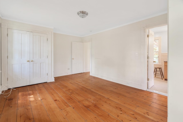 64 Paulding Ave, Cold Spring, NY 10516 - unfurnished bedroom with baseboards, ornamental molding, and hardwood / wood-style floors