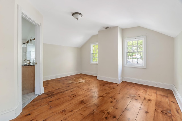 64 Paulding Ave, Cold Spring, NY 10516 - bonus room featuring wood-type flooring, baseboards, visible vents, and vaulted ceiling