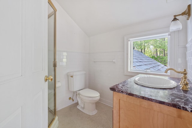 64 Paulding Ave, Cold Spring, NY 10516 - full bath with vanity, toilet, tile walls, a shower stall, and vaulted ceiling