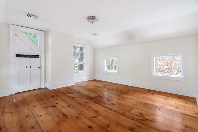 64 Paulding Ave, Cold Spring, NY 10516 - foyer featuring visible vents, baseboards, lofted ceiling, and hardwood / wood-style flooring