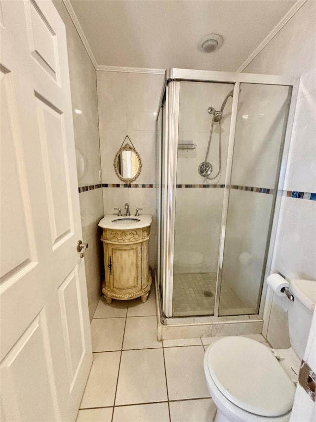 5 Elm St, Great Neck, NY 11021 - bathroom featuring tile patterned floors, a shower stall, toilet, and tile walls