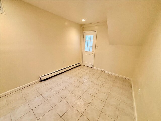 5 Elm St, Great Neck, NY 11021 - unfurnished room featuring baseboards, a baseboard heating unit, recessed lighting, and light tile patterned flooring