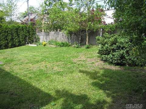 5 Elm St, Great Neck, NY 11021 - view of yard featuring fence