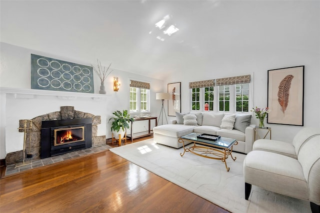 10 Maple Hill Dr, Larchmont, NY 10538 - living area with wood finished floors, a fireplace, and lofted ceiling