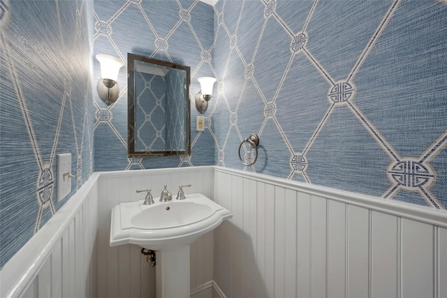 10 Maple Hill Dr, Larchmont, NY 10538 - bathroom with wainscoting and a sink