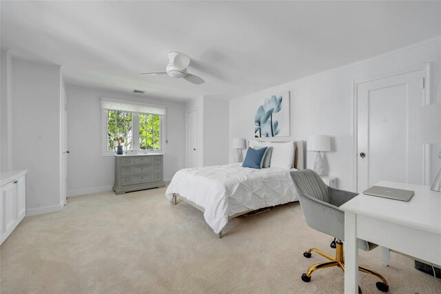 10 Maple Hill Dr, Larchmont, NY 10538 - bedroom with an office area, light colored carpet, ceiling fan, and baseboards