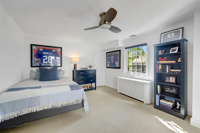10 Maple Hill Dr, Larchmont, NY 10538 - bedroom with radiator heating unit, carpet, and a ceiling fan