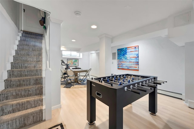 10 Maple Hill Dr, Larchmont, NY 10538 - rec room featuring light wood finished floors, a baseboard radiator, recessed lighting, and a desk