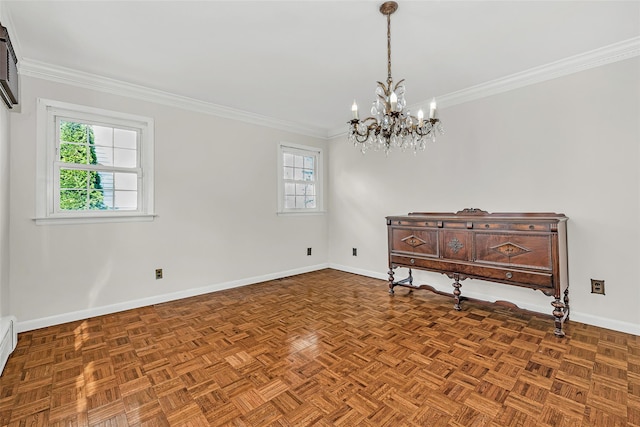 unfurnished room featuring a wealth of natural light, a chandelier, and baseboards