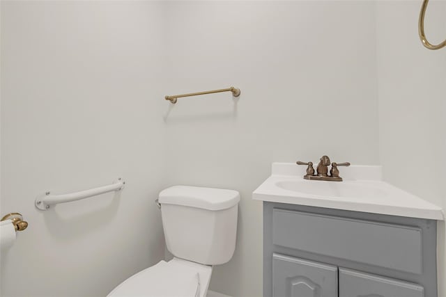 half bath with toilet and vanity