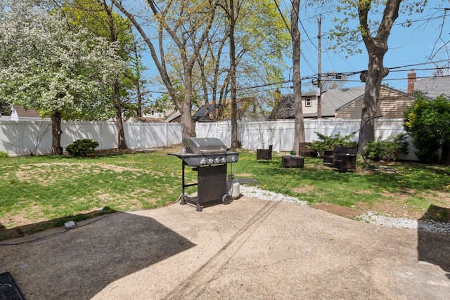 view of patio / terrace featuring area for grilling and a fenced backyard