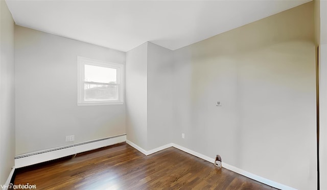 17 Fenmore Dr, Wappingers Falls, NY 12590 - unfurnished room featuring baseboards, dark wood-style flooring, and a baseboard heating unit