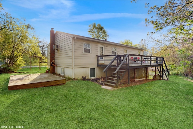 17 Fenmore Dr, Wappingers Falls, NY 12590 - back of house with a chimney, a wooden deck, a yard, and stairway