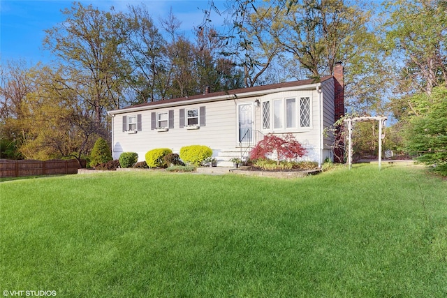 17 Fenmore Dr, Wappingers Falls, NY 12590 - manufactured / mobile home with entry steps, fence, a chimney, and a front yard