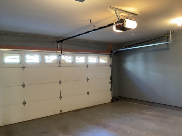 garage featuring a garage door opener