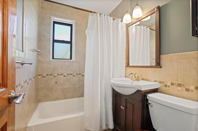 52-15 65th Pl Unit 2A, Maspeth, NY 11378 - bathroom with toilet, tile walls, vanity, and shower / bath combination with curtain