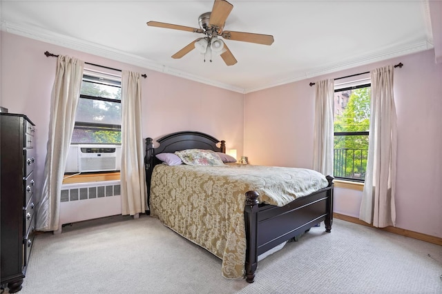 52-15 65th Pl Unit 2A, Maspeth, NY 11378 - bedroom with radiator, light colored carpet, crown molding, a ceiling fan, and baseboards