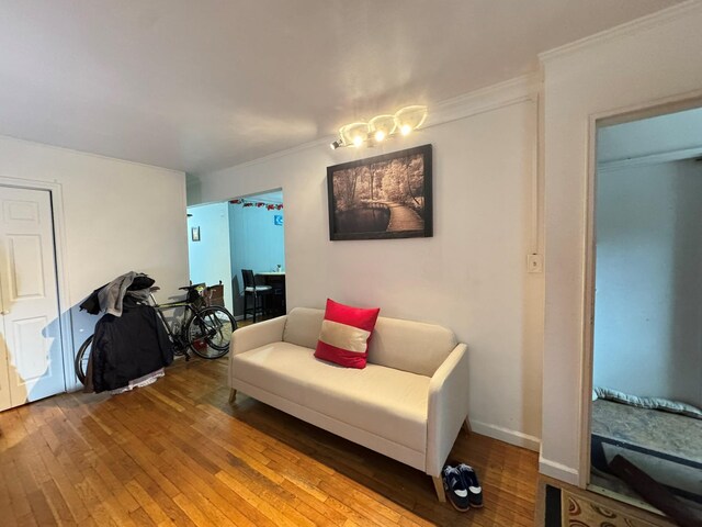 67-07 Fresh Meadow Ln, Fresh Meadows, NY 11365 - living area featuring ornamental molding and wood-type flooring