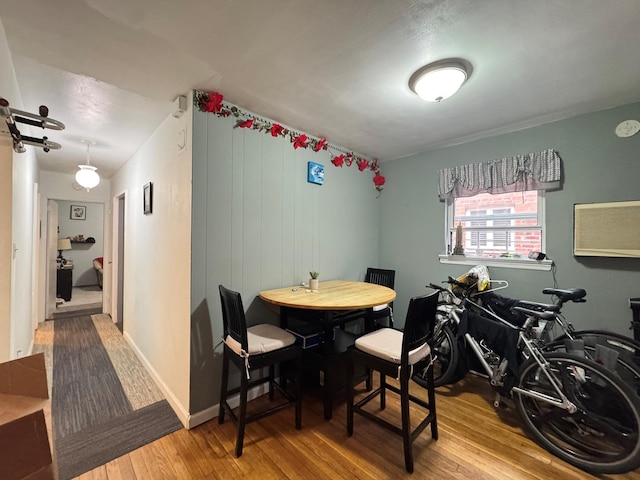 67-07 Fresh Meadow Ln, Fresh Meadows, NY 11365 - dining space with wood-type flooring and baseboards