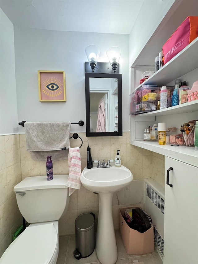 67-07 Fresh Meadow Ln, Fresh Meadows, NY 11365 - half bath with toilet, radiator, and tile walls