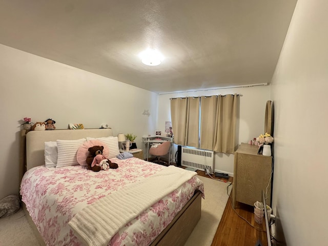 67-07 Fresh Meadow Ln, Fresh Meadows, NY 11365 - bedroom featuring wood finished floors and radiator heating unit