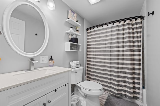 full bathroom with vanity, toilet, and a shower with shower curtain