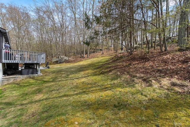 view of yard with a deck