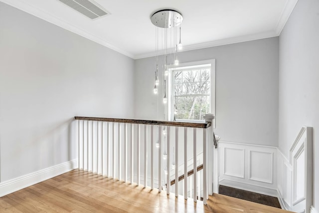 539 Split Rock Rd, Syosset, NY 11791 - stairway featuring crown molding, baseboards, wood finished floors, and visible vents