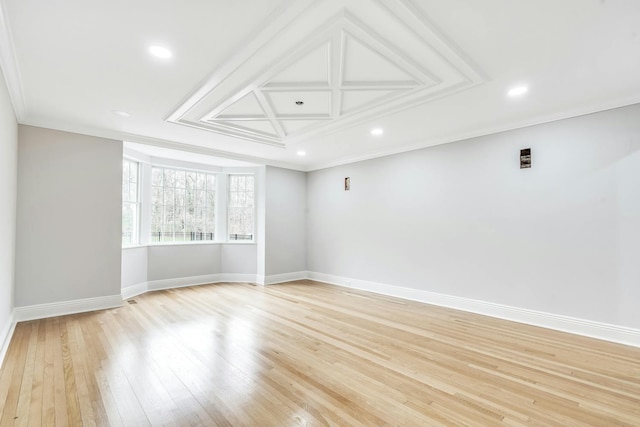 539 Split Rock Rd, Syosset, NY 11791 - spare room featuring light wood-style floors, baseboards, coffered ceiling, and recessed lighting